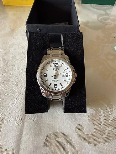 Наручные часы: Casio kişi qol saatı – klassik analoq model - Korpus və kəmər — 1