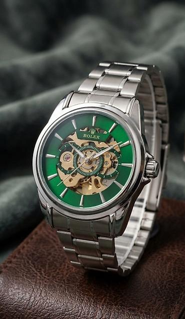 elekron saat: Məhsul: Mexaniki skeletli qol saatı (brend loqolu dizayn) - Korpus və — 1