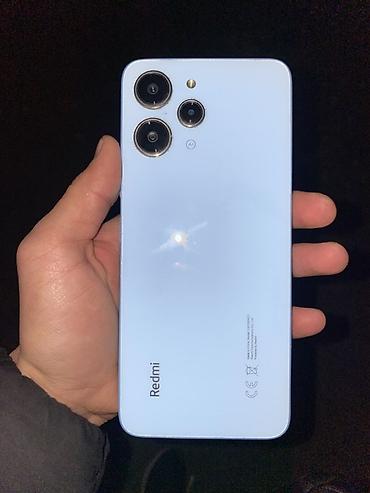 samsung galaxy mega 2 6.3: Смартфон Redmi 12, голубой цвет. Основные характеристики: - Память — 1