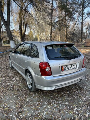 мазда 9: Mazda 323: 2003 г., 2 л, Механика, Бензин, Хетчбек