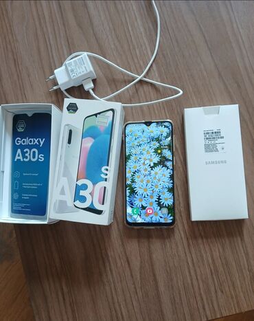 Вилки: Samsung Galaxy A30, 128 ГБ, цвет - Черный, Отпечаток пальца, Две SIM карты