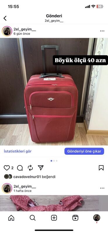 Беговые дорожки: Təkərləri və hərəkətli tutacağı olan qırmızı çamadan. Rahat daşınma