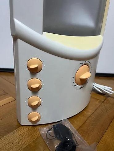 Ostali aparati za negu lica: Solarijum lampa za lice (kućni mini-facial tanner) Opis: - Kompaktna — 11
