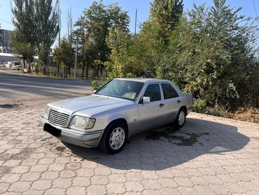немецкий набор ключ: Mercedes-Benz E-Class W124, седан, правый руль, серебристый цвет