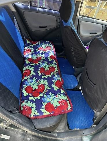 машина антена: Toyota Echo: 2001 г., Автомат, Бензин, Седан — 3