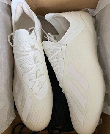 футбольные бутсы купить: Белые футбольные бутсы Adidas X, предназначенные для игры на