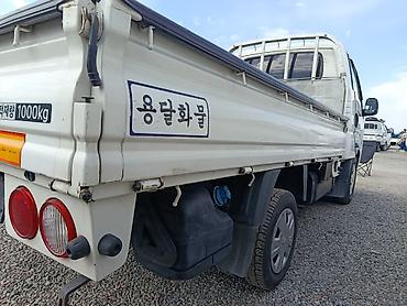 кобит: Kia Bongo III (обновлённый логотип), бортовой малотоннажный грузовик — 5