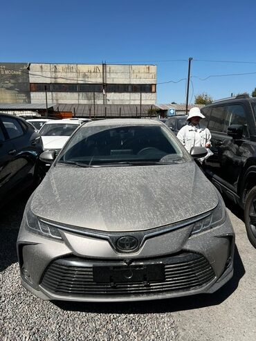 рассрочку машина алам: Элегантный седан Toyota Corolla серого цвета, идеально подходящий для