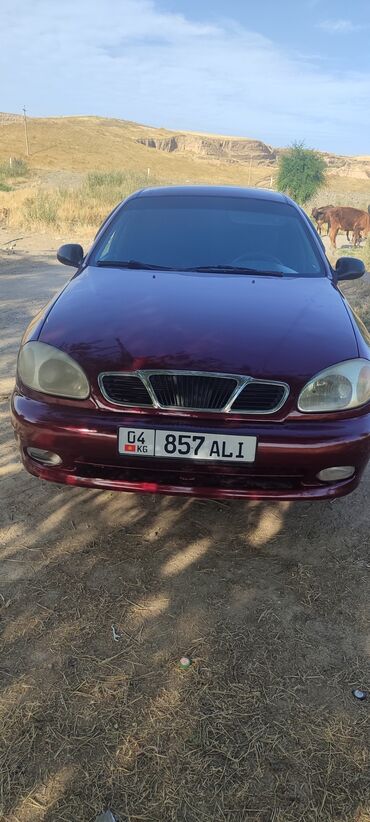 арзан матиз ош: Автомобиль Daewoo Lanos бордового цвета. Это компактный седан с