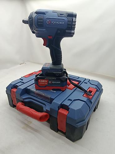 Инструменты: Аккумуляторный ударный гайковерт Excalibur 1/2" Описание: - Мощный — 1