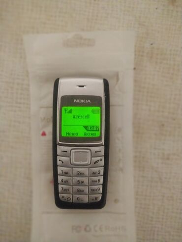 nokia 2115: Nokia C110, rəng - Gümüşü, Zəmanət, Düyməli