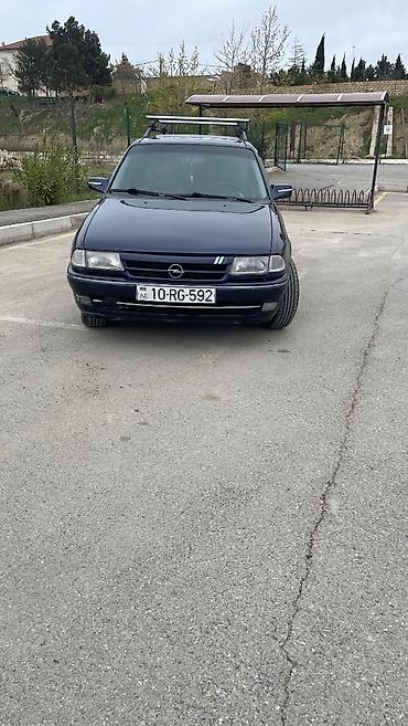 e39 rul: Opel Astra F Caravan (universa) – tünd mavi rəngdə, nömrə 10-RG-592 — 5