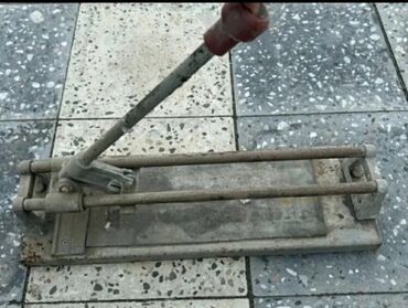 Mişarlar: İşlənmiş Əl ilə çalışan Kafel kəsən stanok, 700 mm, Zəmanətsiz