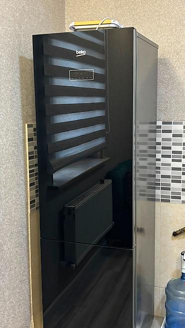 Soyuducular: İşlənmiş 2 qapılı Beko Soyuducu Satılır, rəng - Qara, Təkərli — 5