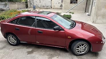 Транспорт: Mazda Lantis: 1997 г., 1.6 л, Механика, Бензин, Хэтчбэк — 3