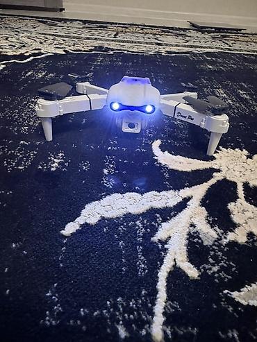 strange things: Квадрокоптер Drone Pro с камерой и пультом 2 камеры пульт защитки - — 4