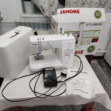 тигил: Тигүүчү машина Janome