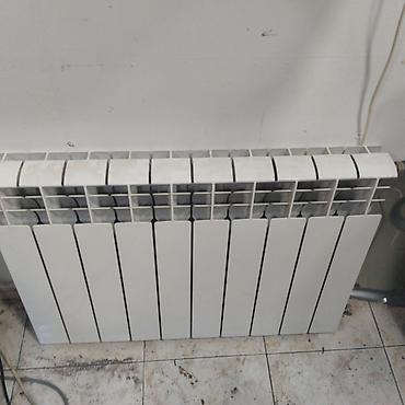 kombi radiatoru satilir: Kombi üçün seksia radiator 10 seksia — 1