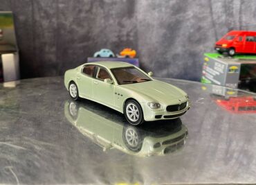Avtomobil modelləri: Коллекционная модель Maserati Quattroporte V light green 2005 — 5
