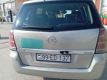 Opel: Opel Zafira, gümüşü rəng, 7 yerlik (3 cərgə oturacaq) minivan — 8