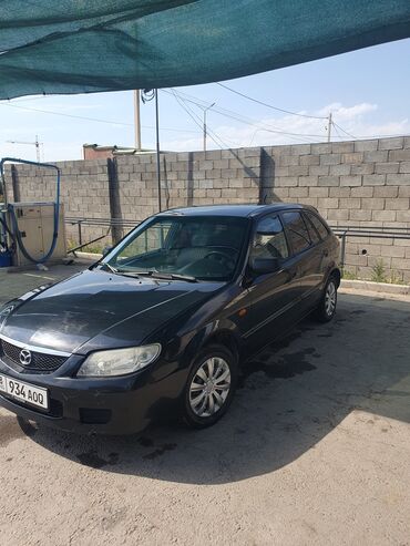 мазда тирбут: Mazda 323: 2001 г., 1.3 л, Механика, Бензин, Хетчбек