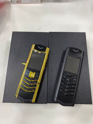 cinde gizli zeng etmek: Vertu Constellation, Düyməli