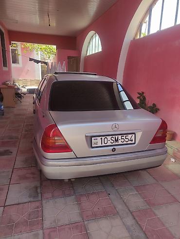 mercedes şəkilləri: Mercedes-Benz 190: 1.8 l | 1995 il Sedan — 4