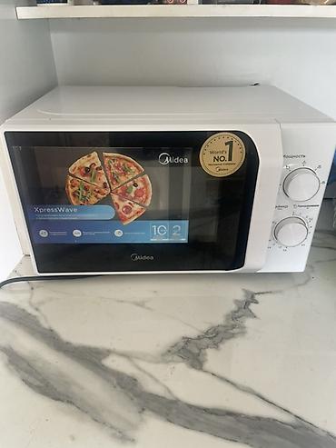 Продается Микроволновая печь Midea XpressWave в белом цвете. Купили