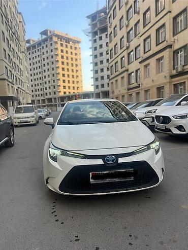 xpeng g3: Toyota Corolla: 2022 г., 1.8 л, Вариатор, Гибрид, Седан — 4