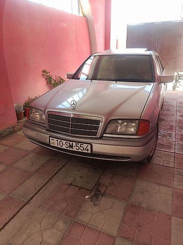 mercedes şəkilləri: Mercedes-Benz 190: 1.8 l | 1995 il Sedan — 1