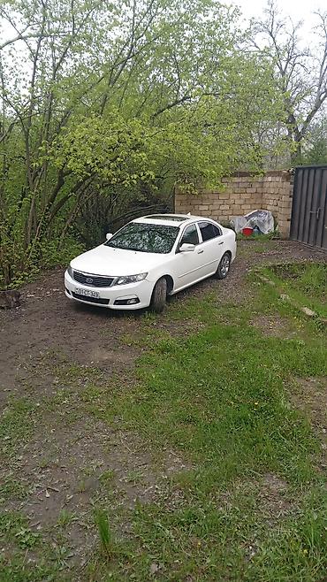 optima otracaqlar: Kia Optima sedan – ağ rəng, 4 qapı, ön‑çəkiş. 2008 ci il motor təzə — 1