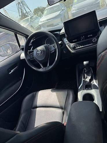 byd e6: Toyota Corolla: 2021 г., 1.8 л, Автомат, Гибрид, Седан — 8