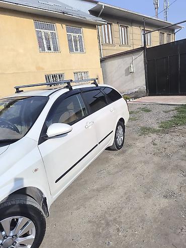 byd q05: Nissan Primera: 2003 г., Универсал — 7