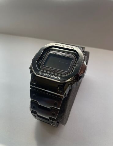 наручные мужские часы: Кварцевый CASIO GMW-B5000EH-1ER сталь Состояние нового Оригинал