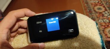 купить компьютер в бишкеке в рассрочку: 4g мобильный модем wifi, батарея держит хорошо. подходит для любых