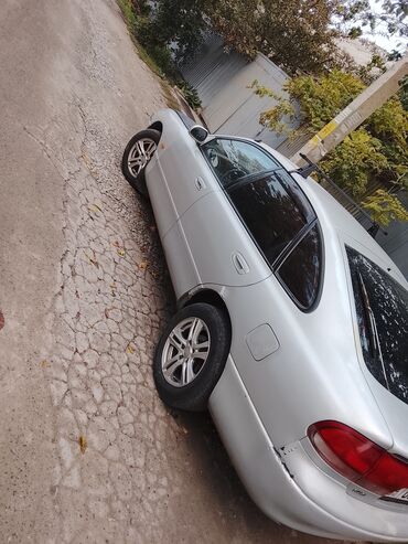 сидения на гольф: Mazda 626: 1994 г., 1.8 л, Механика, Седан