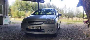 машина для вывоза мусора: Suzuki Liana: 2006 г., 1.5 л, Механика, Бензин, Хэтчбэк