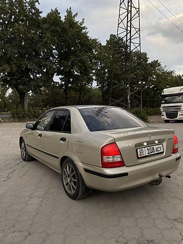 Mazda: Mazda 323: 1998 г., 1.5 л, Механика, Бензин, Седан — 19