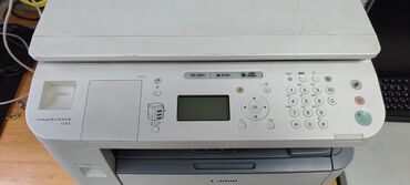 купить ксерокс бу: Многофункциональный принтер Canon imageRUNNER 1133 белого цвета