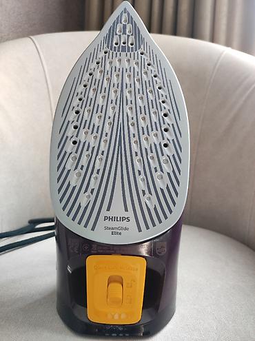 Утюги: Утюг Philips DST7061 Характеристики: Постоянная подача пара: 55 г/мин — 6
