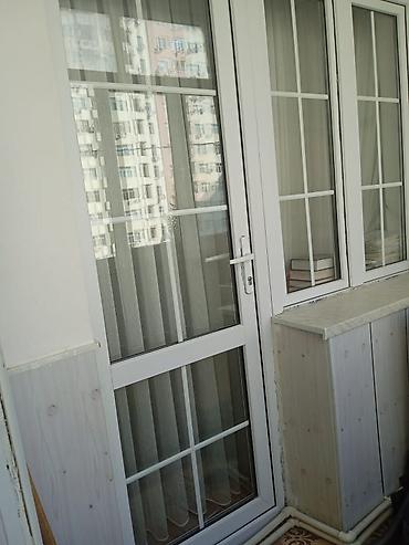 ağ qapı: Qapı pəncərə.Təzədir.Ölcü eni 1.85 hündürlüyü 2.15.Ünvan — 2