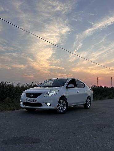kollektor qutusu: Nissan Sunny: 1.5 l | 2013 il Sedan — 5