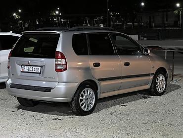 молдинги е39: Mitsubishi Space Star: 2002 г., Минивэн — 1