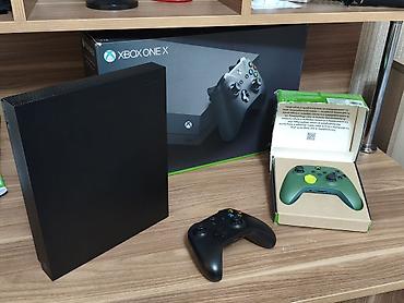 xbox seris x: Xbox One X 1TB oyun konsolu Xüsusiyyətlər: - 1TB daxili yaddaş – — 2