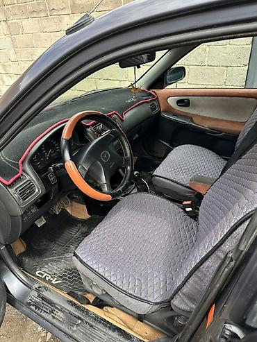 385 55: Mazda Capella: 1999 г., 2 л, Механика, Бензин, Универсал — 7