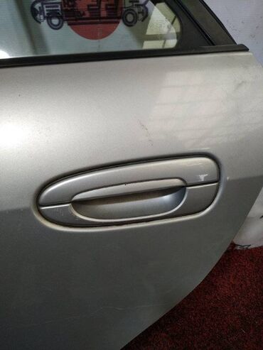 Суппорты: Ручка двери внешняя Mazda Capella GF8P 1800 2000 задн. лев. (б/у)#