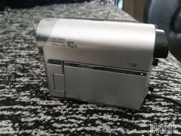 Video kamere: 1. Kamkorder Sony Handycam Dcr-Sx21 siva 2. Sony DCR-HC51E Camcorder — 12