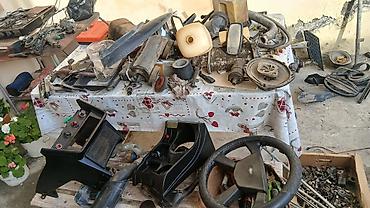 Digər avtomobil ehtiyat hissələri: Avtomobil ehtiyat hissələri dəsti Təsvir: - 4 ədəd polad disk — 12