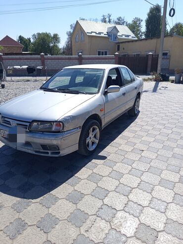 деу легенза: Автомобиль Nissan Primera P10 в кузове седан, выполненный в