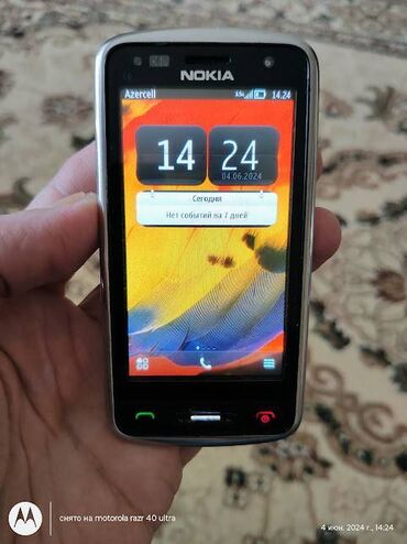 retro telefon: Nokia C6-01, цвет - Серебристый, Сенсорный